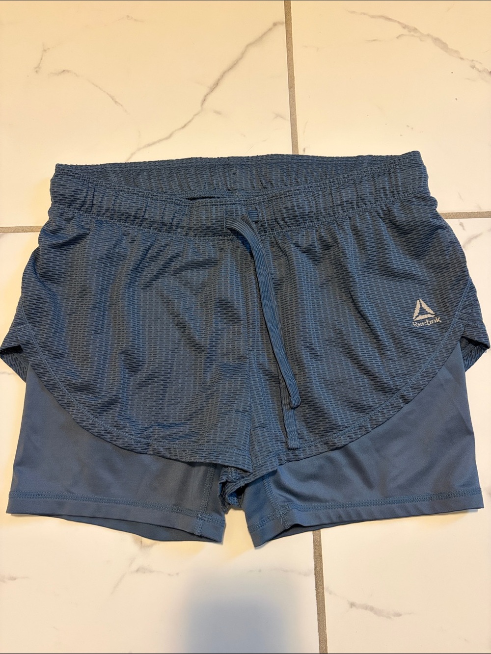 Reebok Women's Slate Blue Layered Athletic Shorts